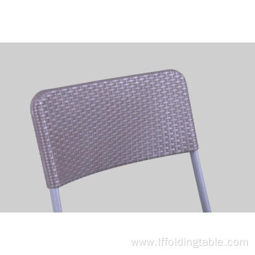 Plastic rattan chair with metal legs